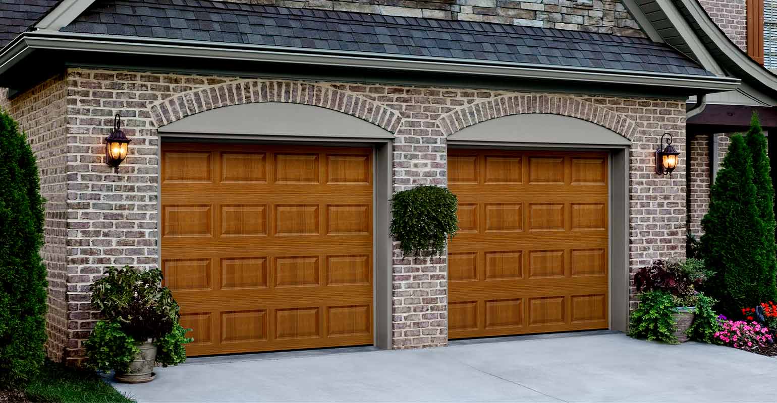 Aluminum faux wood garage doors.