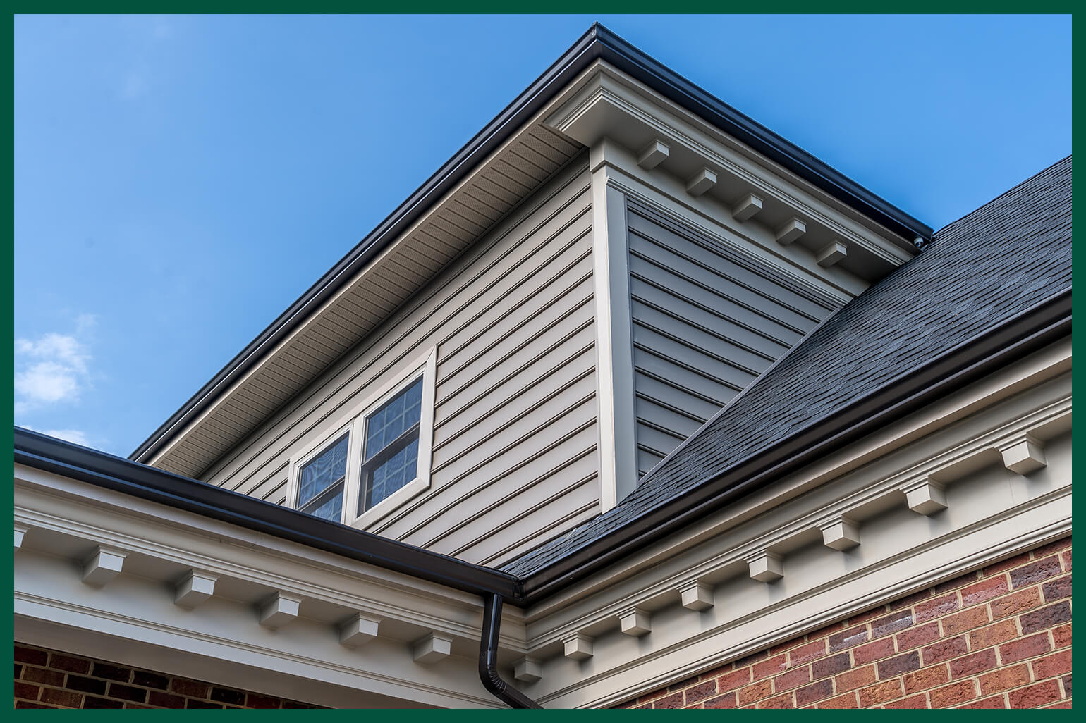 Decorative molding on a grey house