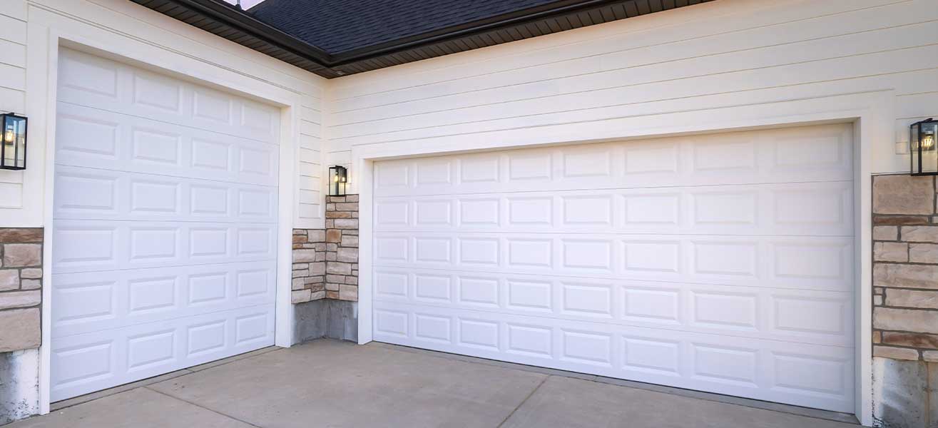 A high lift garage door and a regular garage door.