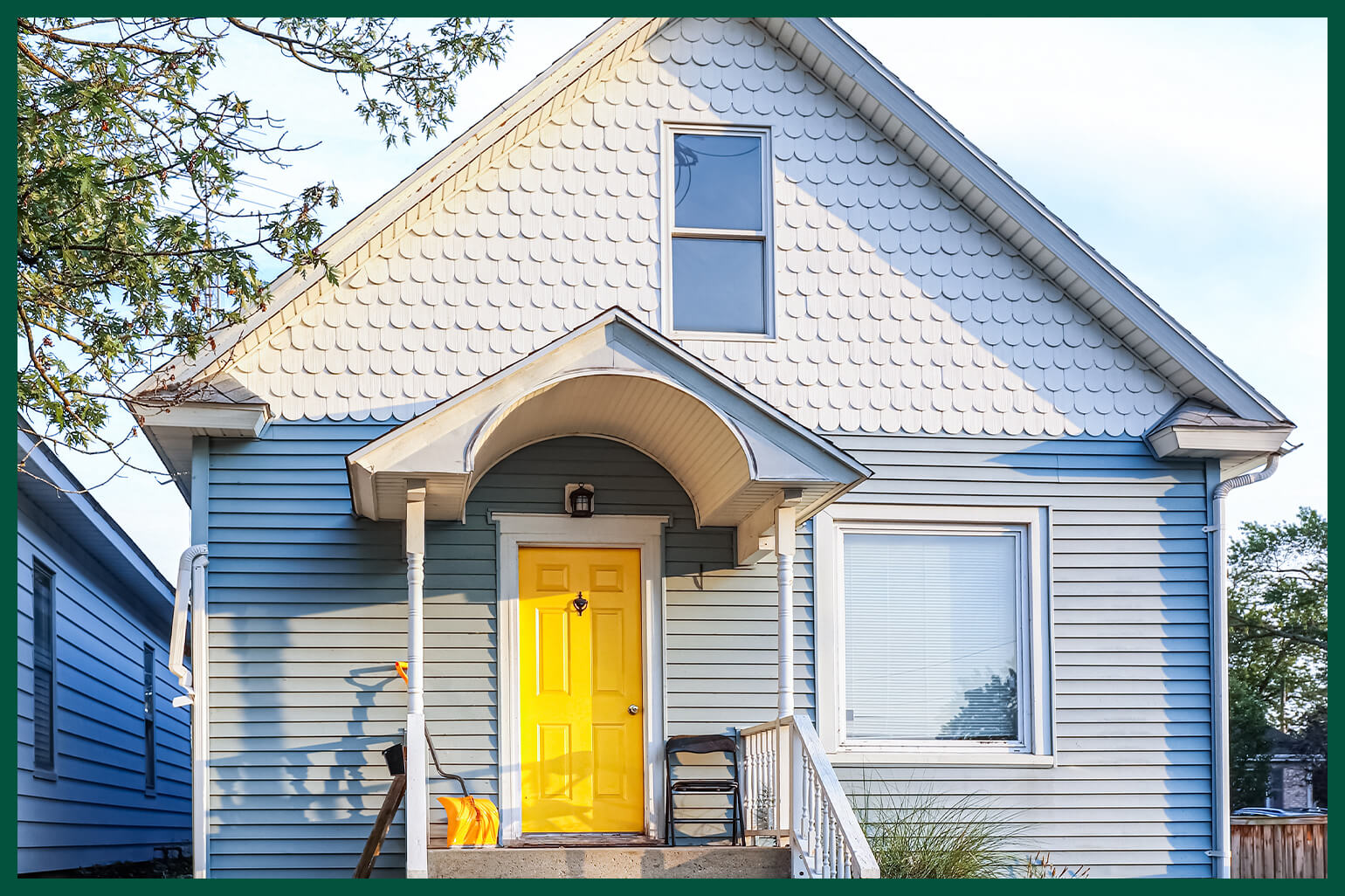 Bungalow with scallop siding on gable