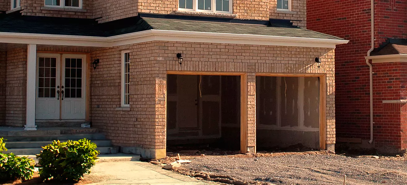 A garage door frame is finished and ready for the door installation.