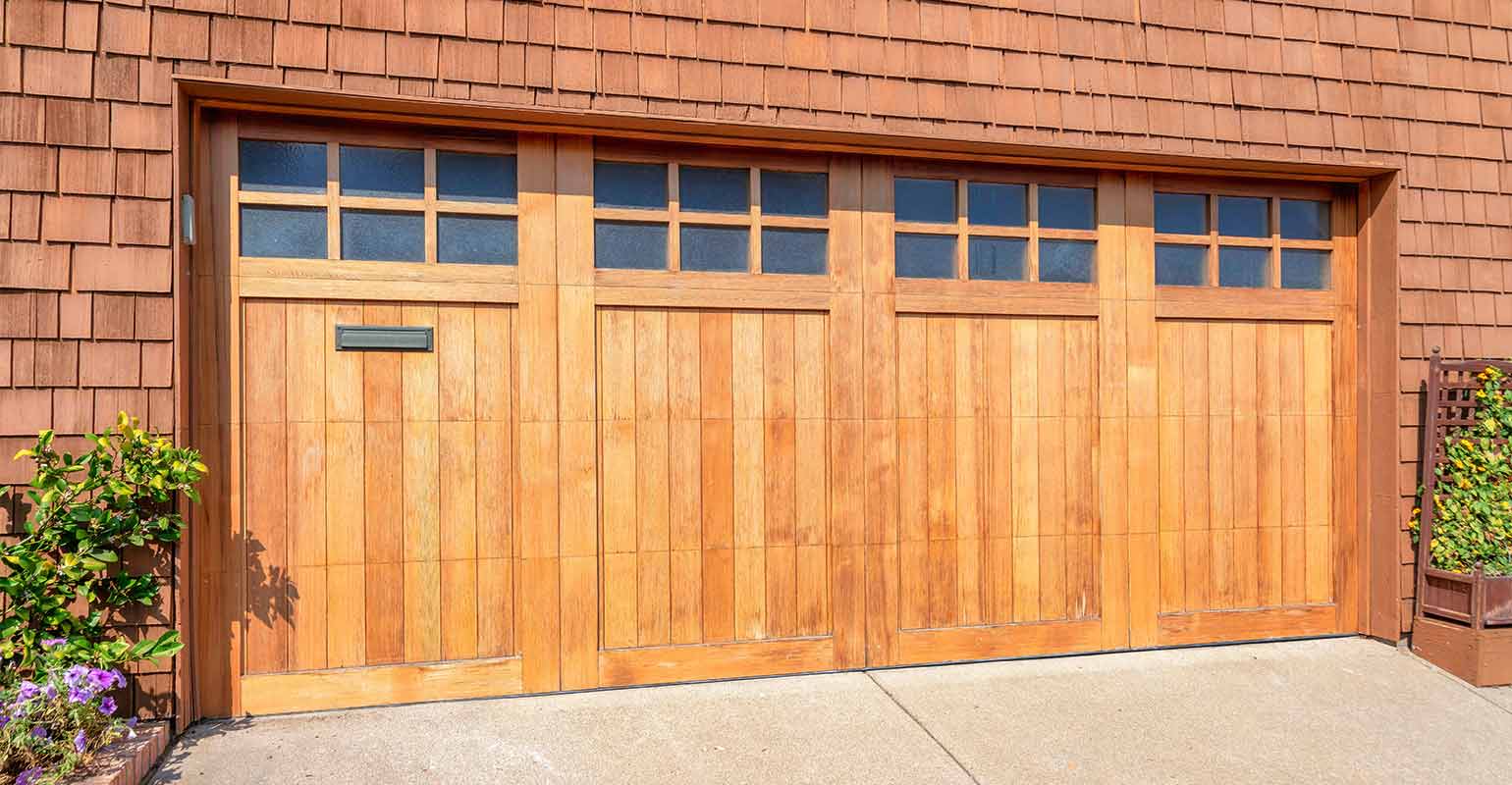 Light faux wood garage doors.