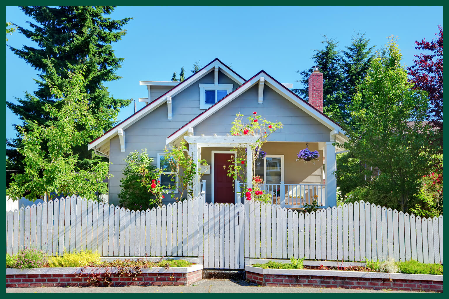 Cute house with wavy white fence