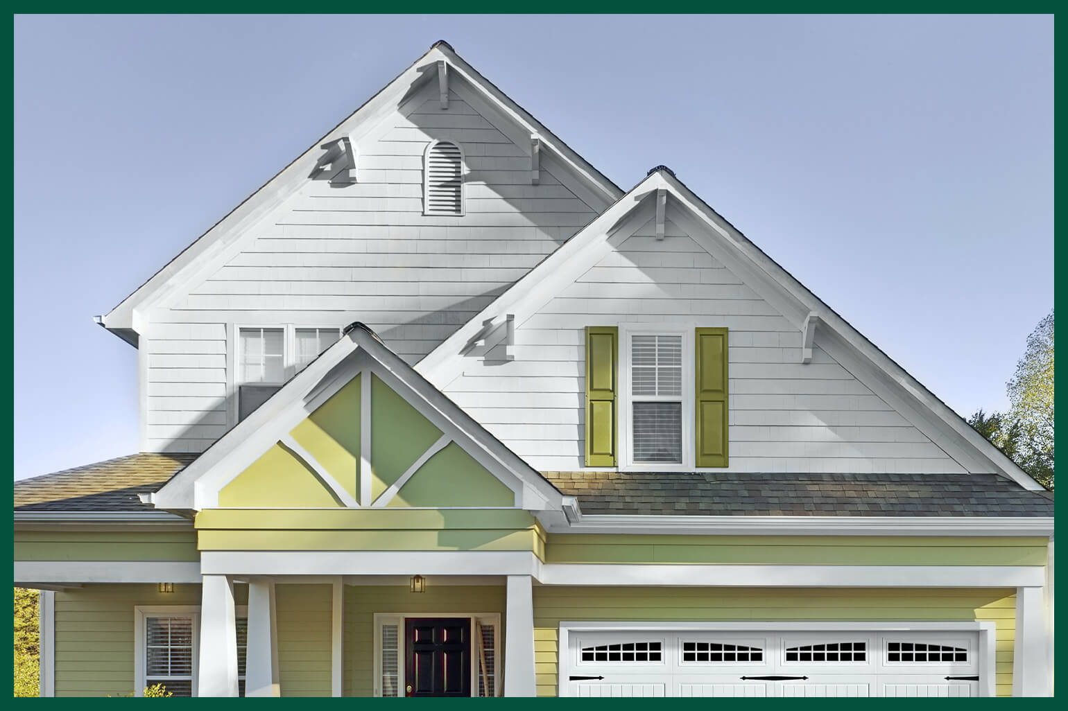 Grey home with white trim on gable