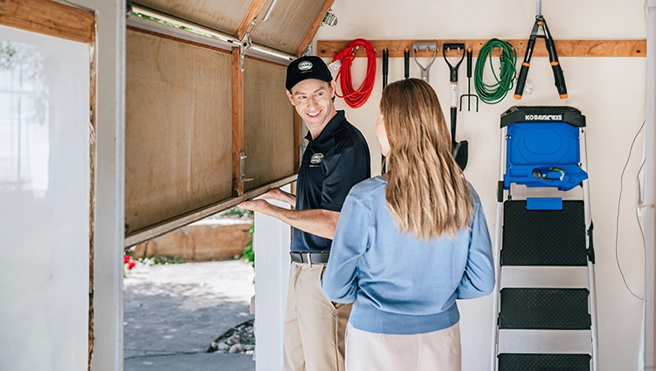 A PDS expert explaining weather stripping to a client.