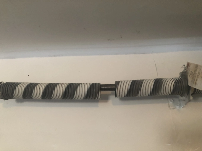 Broken garage door spring | Precision Garage Door Service of Knoxville